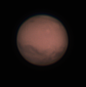Mars in Opposition - aufgenommen durch Wolkenlücken mit dem Heliometer der Kuffner-Sternwarte, am 7. Dezember 2022, 22:19 MEZ, f = 6,6 m. 0,5 x 5000 x ca 10 ms mit Webkamera. Bild: Heinrich Bauer, Aufnahme: G. Wuchterl