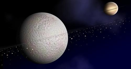 Künstlerische Darstellung eines Rings aus Teilchen um Saturns zweitgrößten Mond Rhea