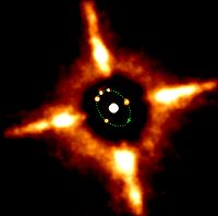 Dieses Komposit-Bild zeigt fünf Aufnahmen von Eugenias Mond (am grünen Oval) mit dem Asteroiden im Zentrum.