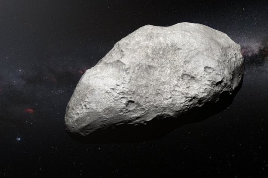 Die künstlerische Darstellung zeigt den Exil-Asteroiden 2004 EW95, den ersten kohlenstoffreichen Asteroiden der im Kuipergürtel bestätigt wurde und ein Relikt des frühen Sonnensystems ist. Bild: ESO/M. Kornmesser