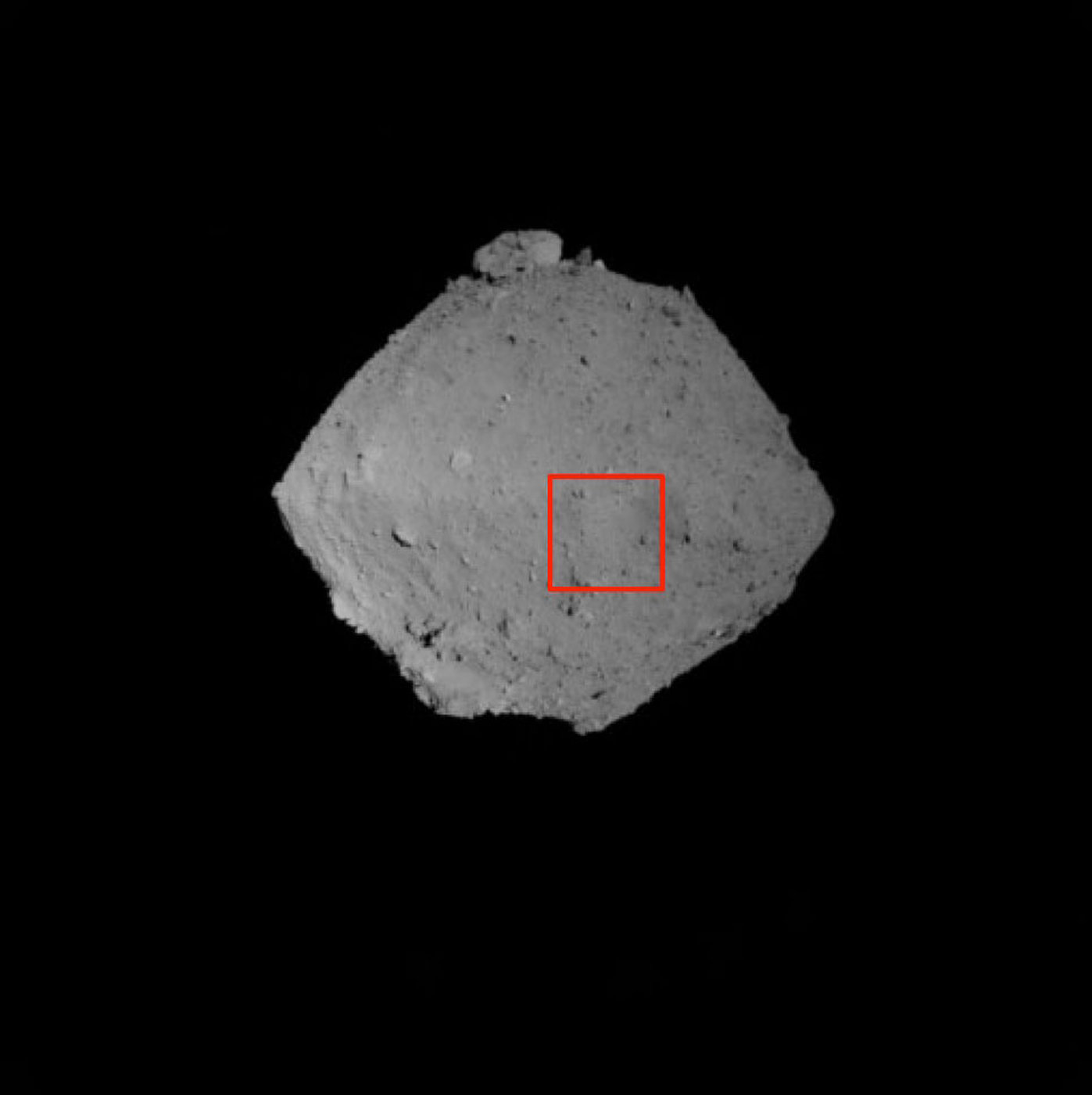 Ein Bild des Asteroiden Ryugu aus einem Abstand von 1 km aufgenommen mit der optischen Navigationskamera. Bild: CJAXA, University of Tokyo, Koichi University, Rikkyo University, Nagoya University, Chiba Institute of Technology, Meiji University, University of Aizu, AIST.